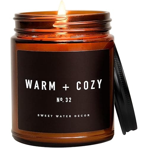 Sweet Water Decor Warm and Cozy Candle | Pine, Orange, Cinnamon, and Fir Balsam Winter Scented Soy Candles for Home | 9oz Amber Jar with Black Lid, 40 Hour Burn Time, Made in the USA